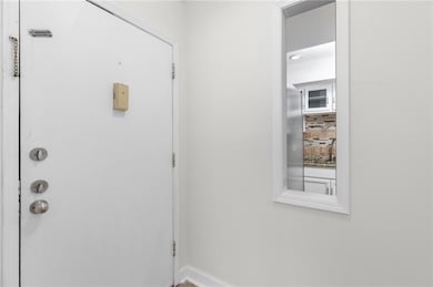 Entryway featuring baseboards
