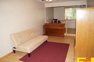 This room could be used as a family room, dining room or could easily be converted into a 3rd bedroom.