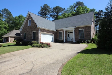 Attached garage and paved driveway