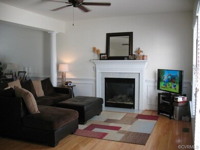Family Room with columns and gas fireplace