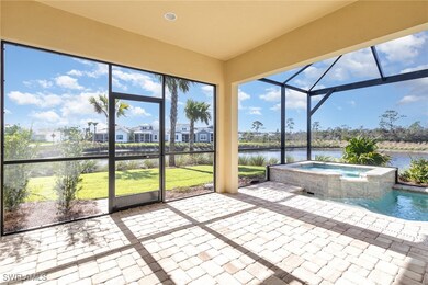 Unfurnished sunroom featuring a jacuzzi and a wate