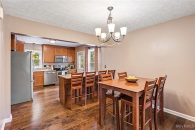 Open-concept dining and kitchen, granite counterto