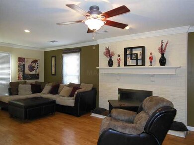 Large Den w/Lots of Space.  Brick Wood Burning FP.