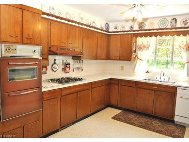 The well-equipped kitchen has plenty of counter an