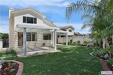 Tranquil backyard was professionally landscaped wi