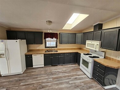 laundry room with custom fit appliances that stay