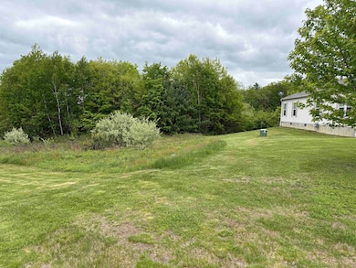 side view of home-no home next to it