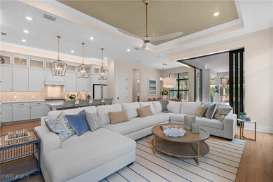 Living area featuring recessed lighting, crown mol