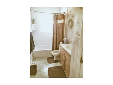 Hall Bathroom with linen closet.