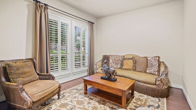 The formal living room or music room features a la