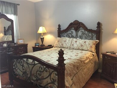 Master bedroom is roomy.