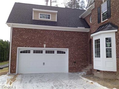 Exterior Front - Two Car Side Entry Garage-Courtya