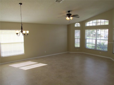 Dining Room and living area is open & bright with easy care tile flooring