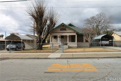 Street view of home with dual driveways
