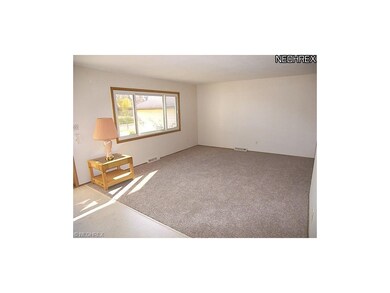 The living room and dining room have newer carpet 