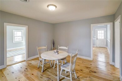 Main living area, but staged as dining room. plent