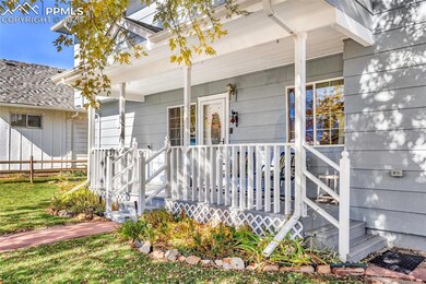 Property entrance featuring covered porch