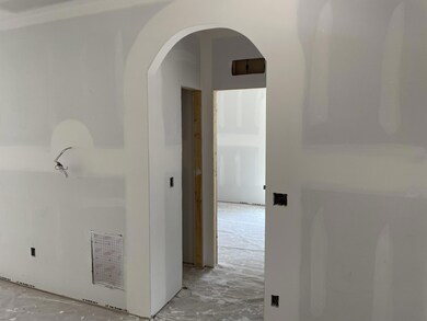 Archway Leading to Secondary Bdrms