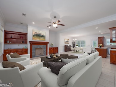 Virtually staged open-concept living area perfect for entertaining.