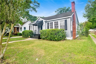 Bungalow-style home featuring a front yard, roof w
