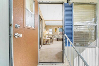 Front door entry into the living room.