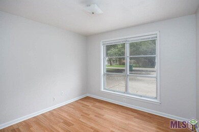The room is accessed from the kitchen or living ro