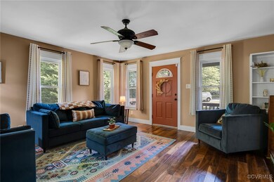 Living area with plenty of natural light, wood fin