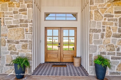 Entrance to property with french doors
