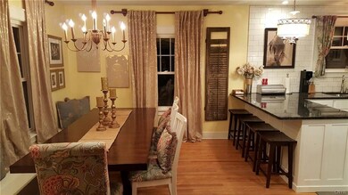 Dining area open to the amazing chef's kitchen.
