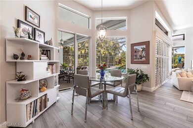 Dining area with plenty of natural light, wood fin