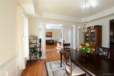 Open view from dining room, across foyer, and into