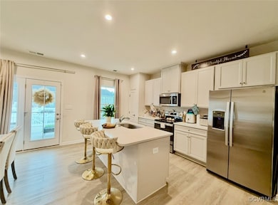Kitchen with appliances with stainless steel finis