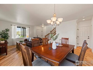 Bright and beautiful formal living and dinning area.  Rich hickory hardwood floors through out the main floor.