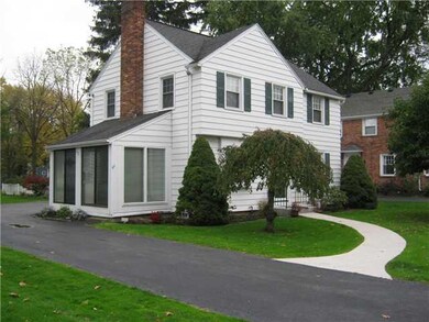 Exterior Front Side viesw with 3 season room