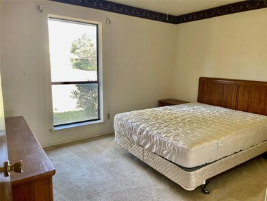 Bedroom with carpet floors