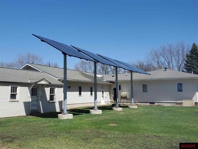 Back of 410 First Street N. with solar panels