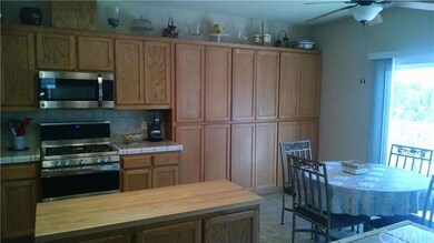 Numerous oak cabinets, and a nice breakfast area w