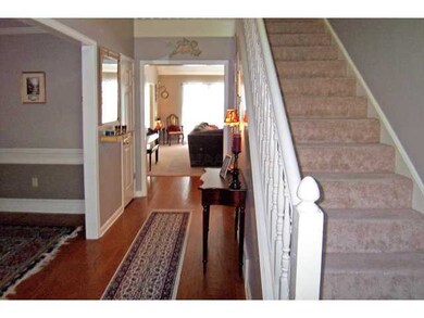 Entry, beautiful floors invite you in, dining room