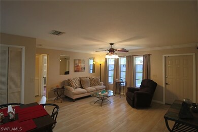 New porcelain plank tile flooring in main living areas.