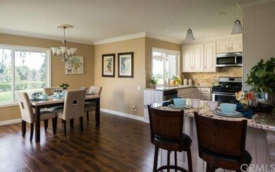 BREAKFAST COUNTER AND DINING ROOM, OPEN KITCHEN