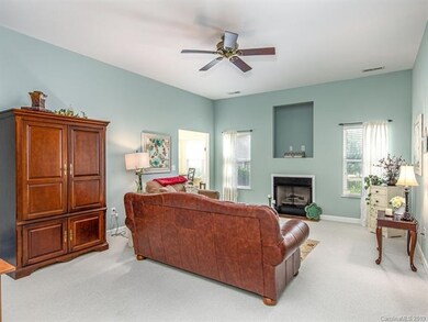 Peaceful Living room with Fireplace and alcove.