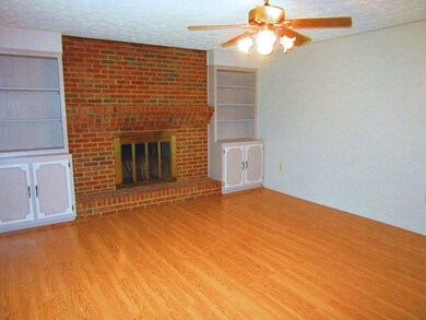 HW floors and firepl in LR