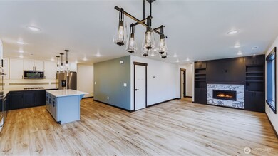 Seamless flow from great room to dining and kitchen