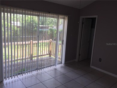 Family Room overlooks back porch and yard