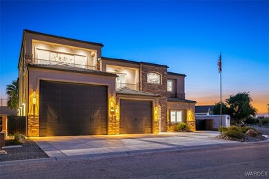 View of front facade featuring a garage