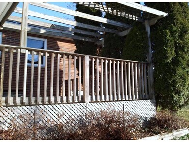 Deck with pergola off the attached garage.
