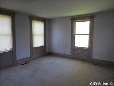Living Room Just inside the front door to the left