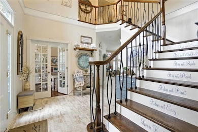 Immediately enter through the expansive foyer to the richly appointed interior