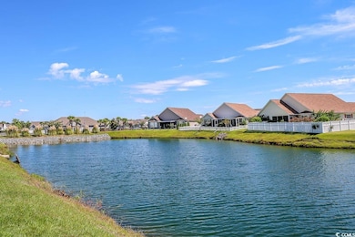 Water view with nearby suburban area