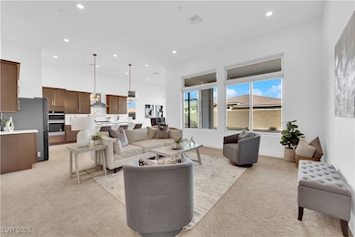 Living room featuring light colored carpet and rec